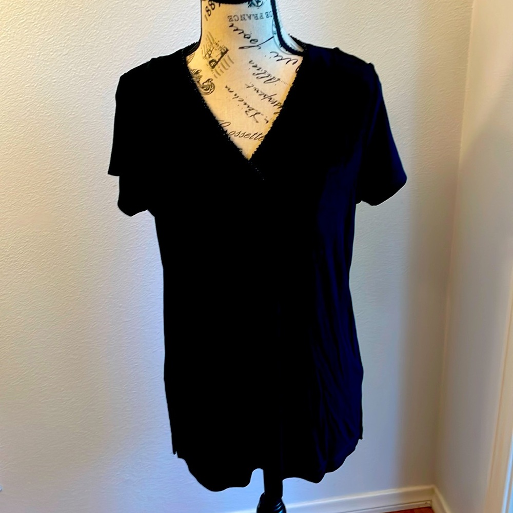 Chicos travelers black top with beaded neckline